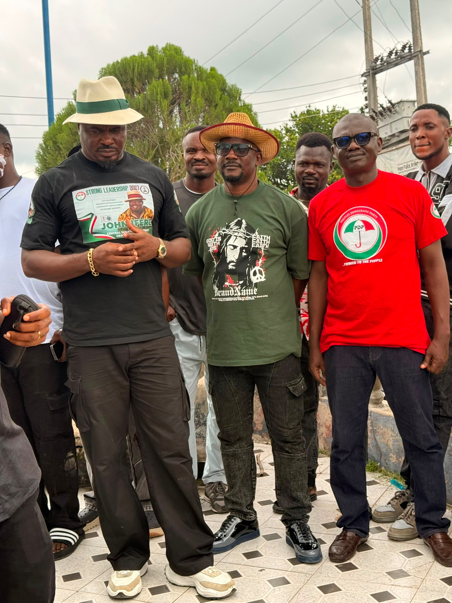 John Ifere standing with members of his campaign team